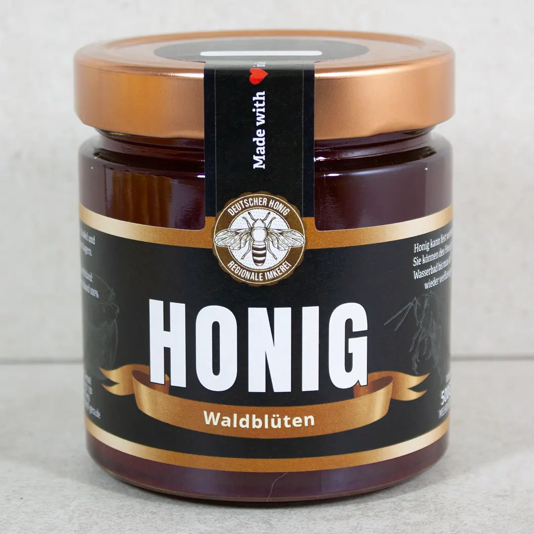 Brauner, flüssiger und Würziger Waldblütenhonig im Glas